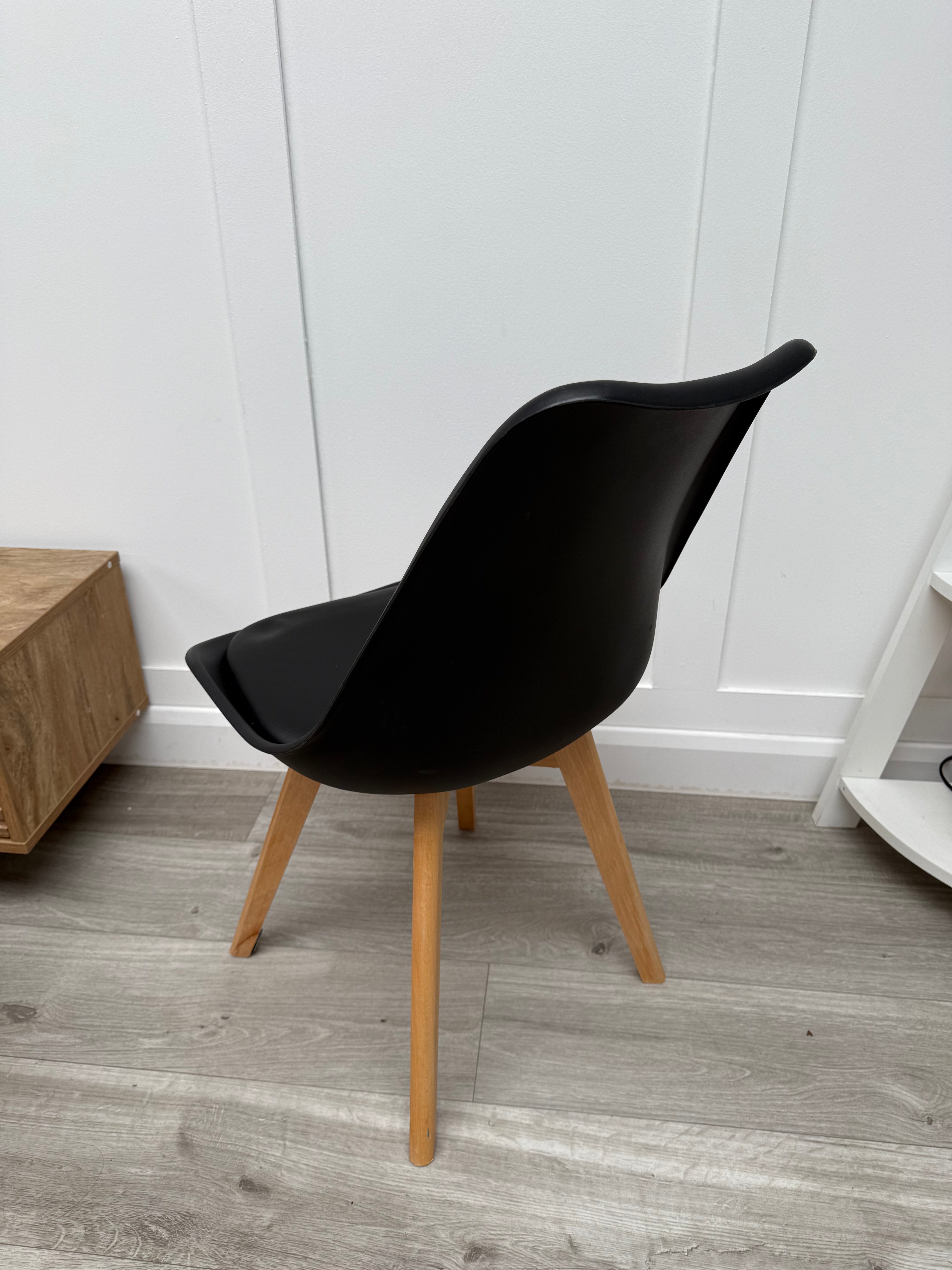 Luxury black Tulip dining chair with cushion
