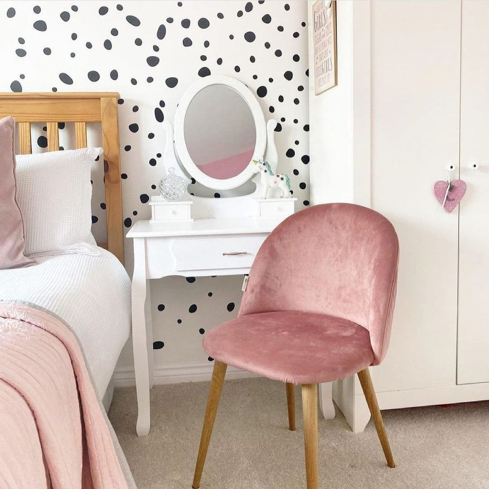 Pink Lucia velvet chair at a white dressing table