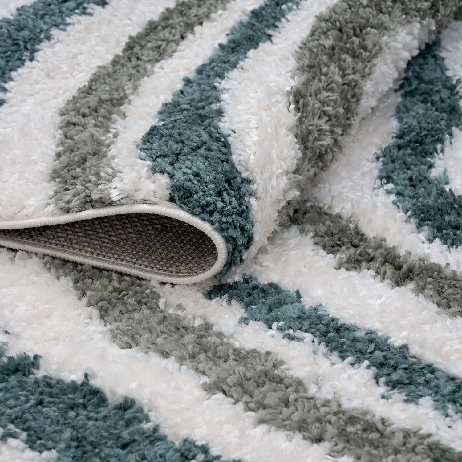 Moodi Shaggy Green Rippletide Rug - PN Home