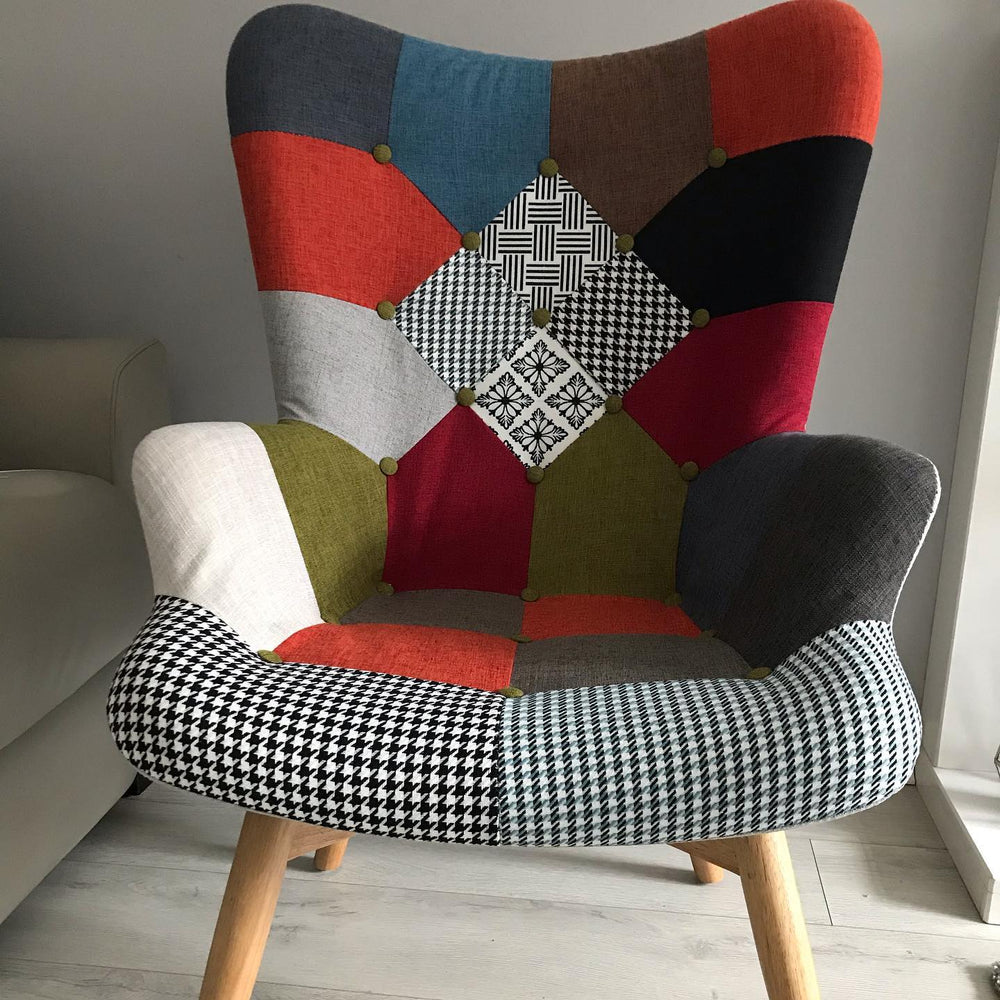 Harper patchwork armchair with wooden legs in a living room